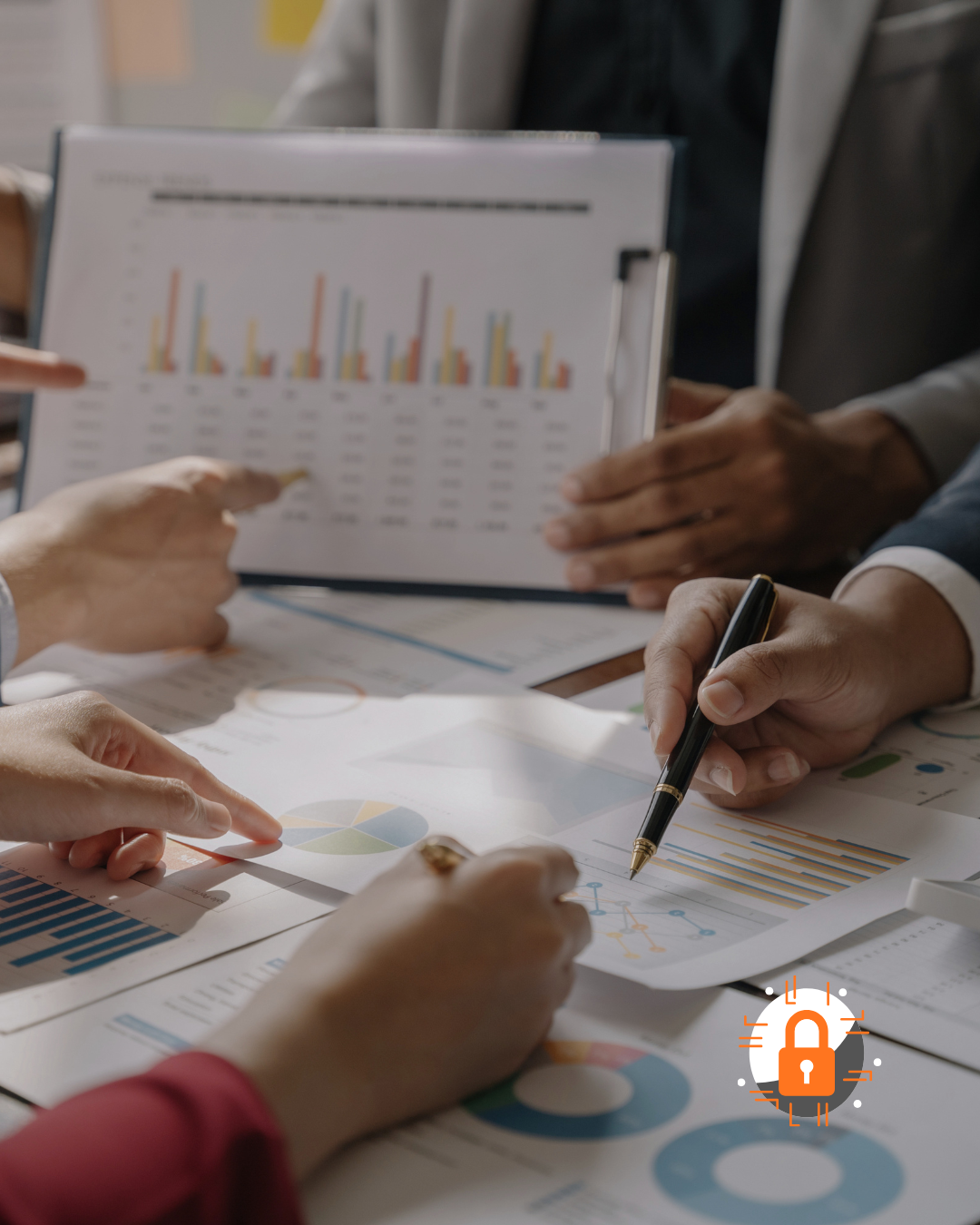 Image of paperwork and auditing process, with hands showcasing graphs, charts and paperwork, Keep This Number maturity audits and gap analysis offer