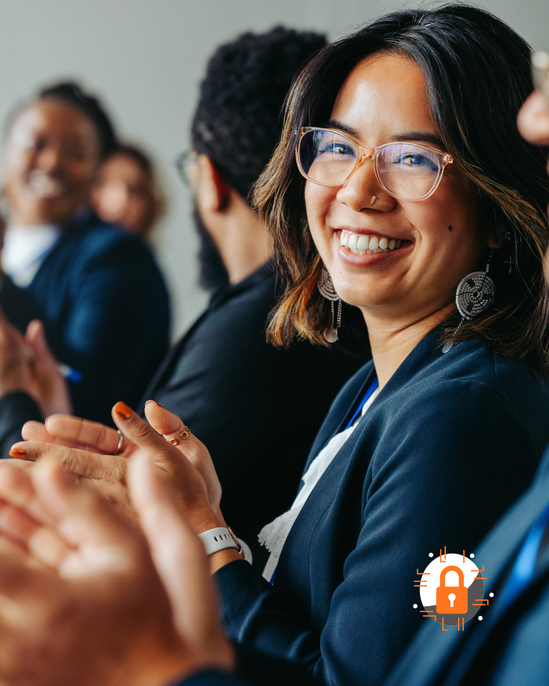 Image of woman smiling during corporate training - describes Keep This Number's workshops and training on GDPR, ITIL and information security